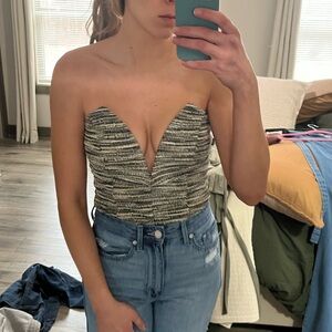 Strapless Textured V-cut bodysuit. Never worn.